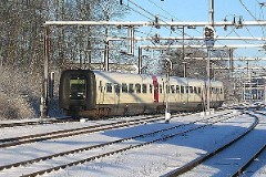 Ic3 trainset MFA 5062/MFB 5262 (named Mathilde Fibiger) photographed at the railway station in Fredericia, 29. December 2004.  The Ic3 was built by ABB Scandia in Denmark. Each unit consists of 3 coaches. Built in a number of 92 trainsets. The trainsets were put in service in 1989 - 1998. 4 diesel engines of 294 kW per trainset. Max speed 180 km/h - 112 mph. Length 58 800 mm. Weight 97 metric tonnes. 16 seats 1st class, 128 seats 2nd class. Up to 5 trainsets can be put together. The MFA 5062/MFB 5262 was put in service in 1992.
